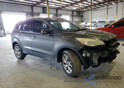 2016 Ford Escape Titanium z USA, uszkodzony, nr VIN 1FMCU9J94GUC60757